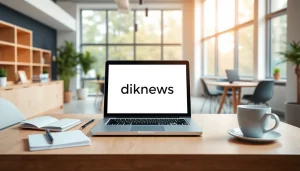 Showcasing the website https://diknews.co.uk on a modern laptop amidst a professional workspace.
