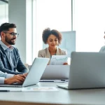 Optimize competitive intelligence for sales with a professional team analyzing data in a bright office.