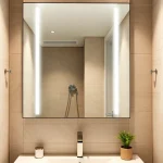 Elevate your space with an elegant bathroom mirror reflecting modern design.