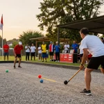 FOPI Kota Balikpapan sedang mengadakan pertandingan petanque dengan suasana seru dan dukungan komunitas.